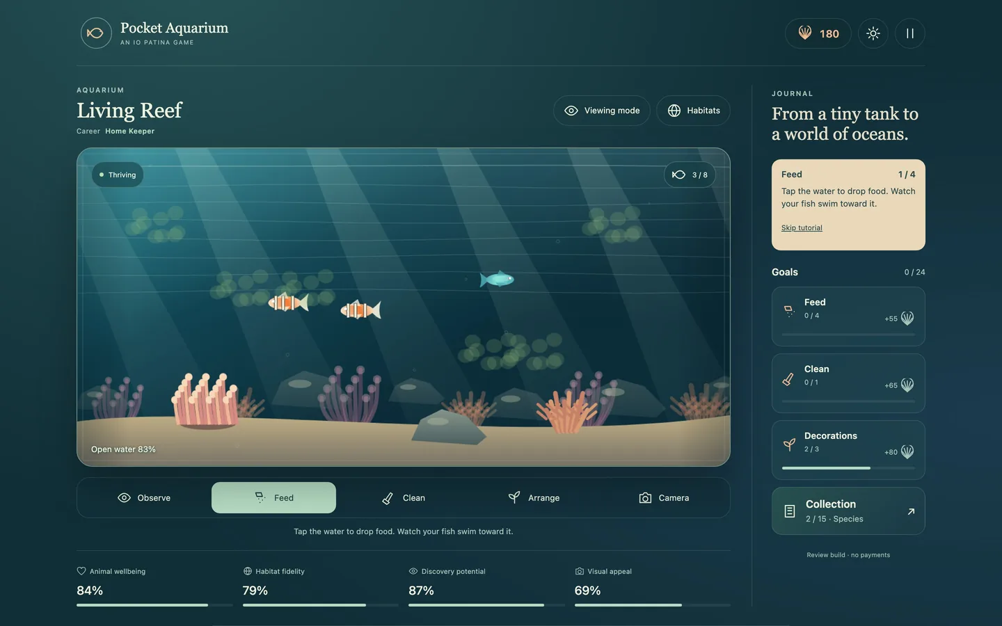 The Living Reef tank on a desktop screen, with the tool belt below it and the journal goals alongside