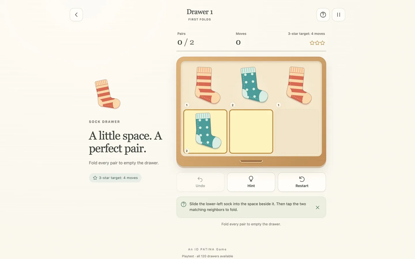 The first-level board on a desktop screen, showing socks and empty cells in a drawer grid